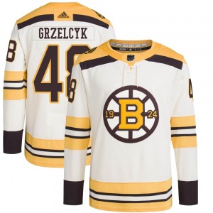 Authentic Adidas Youth Matt Grzelcyk Cream 100th Anniversary Primegreen Jersey - NHL Boston Bruins